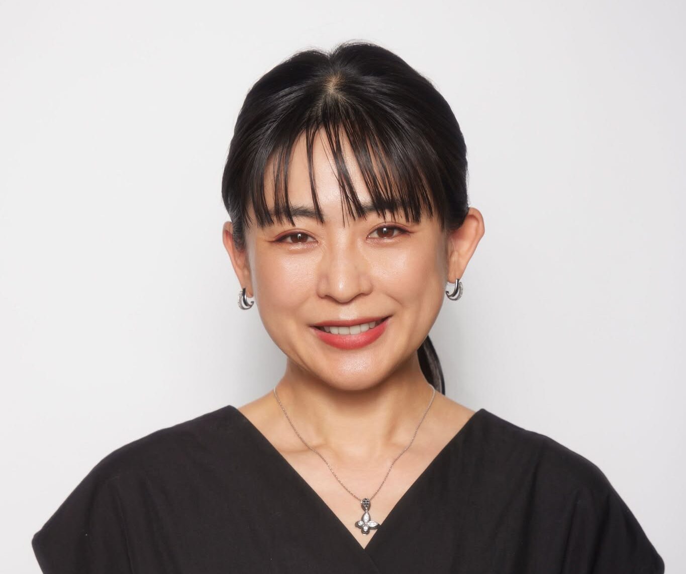 種田 宏美さんの左写真